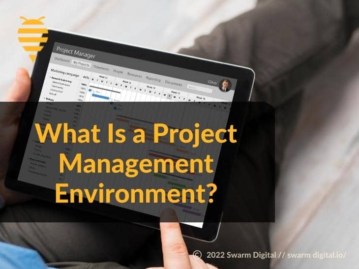 Featured- Someone using a project management app - What Is a Project Management Environment?