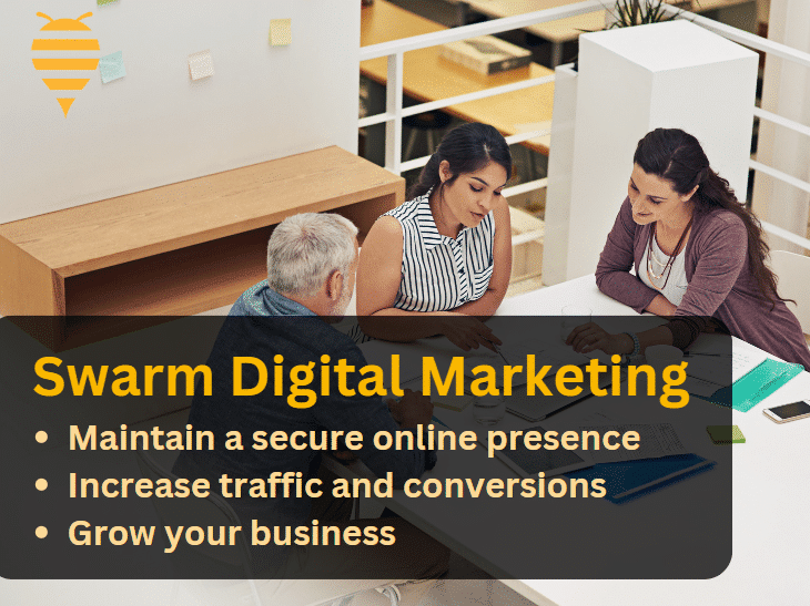 This image features a team at Swarm Digital Marketing discussing best practices for increased website traffic and conversions.