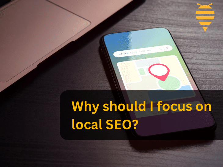 this graphic features a mobile phone beside a laptop, that has a digital map open, with a red pindrop nearby to the user. There is overlay text highlighting the question: Why should small business owners focus on local SEO. In the top right is the swarm digital marketing logo.
