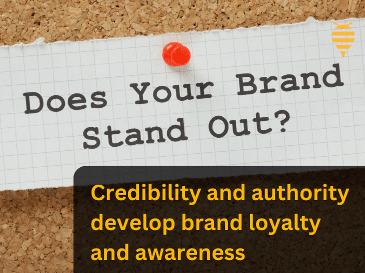This graphic displays a paper note pinned to a board with 'does your brand stand out' written on it in marker. There is overlay text describing that credibility and authority develop brand loyalty and awareness. In the top right is the swarm digital marketing logo.